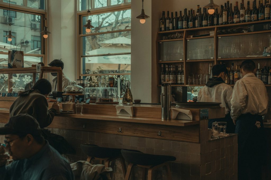 inside of a coffee shop serving customers