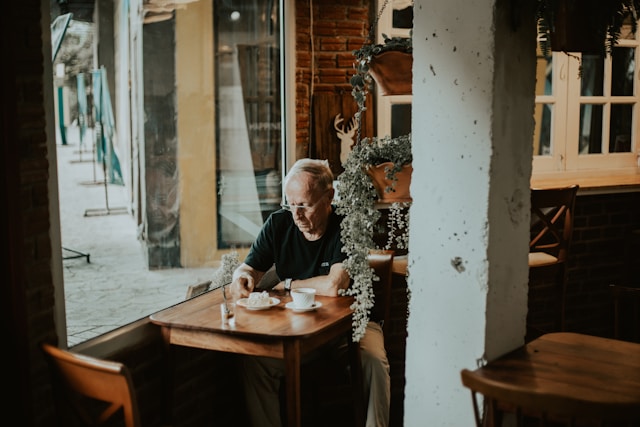 a man sitting in a cafe