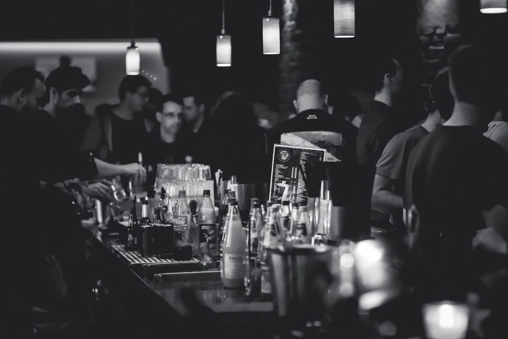busy bar with drinks on the table